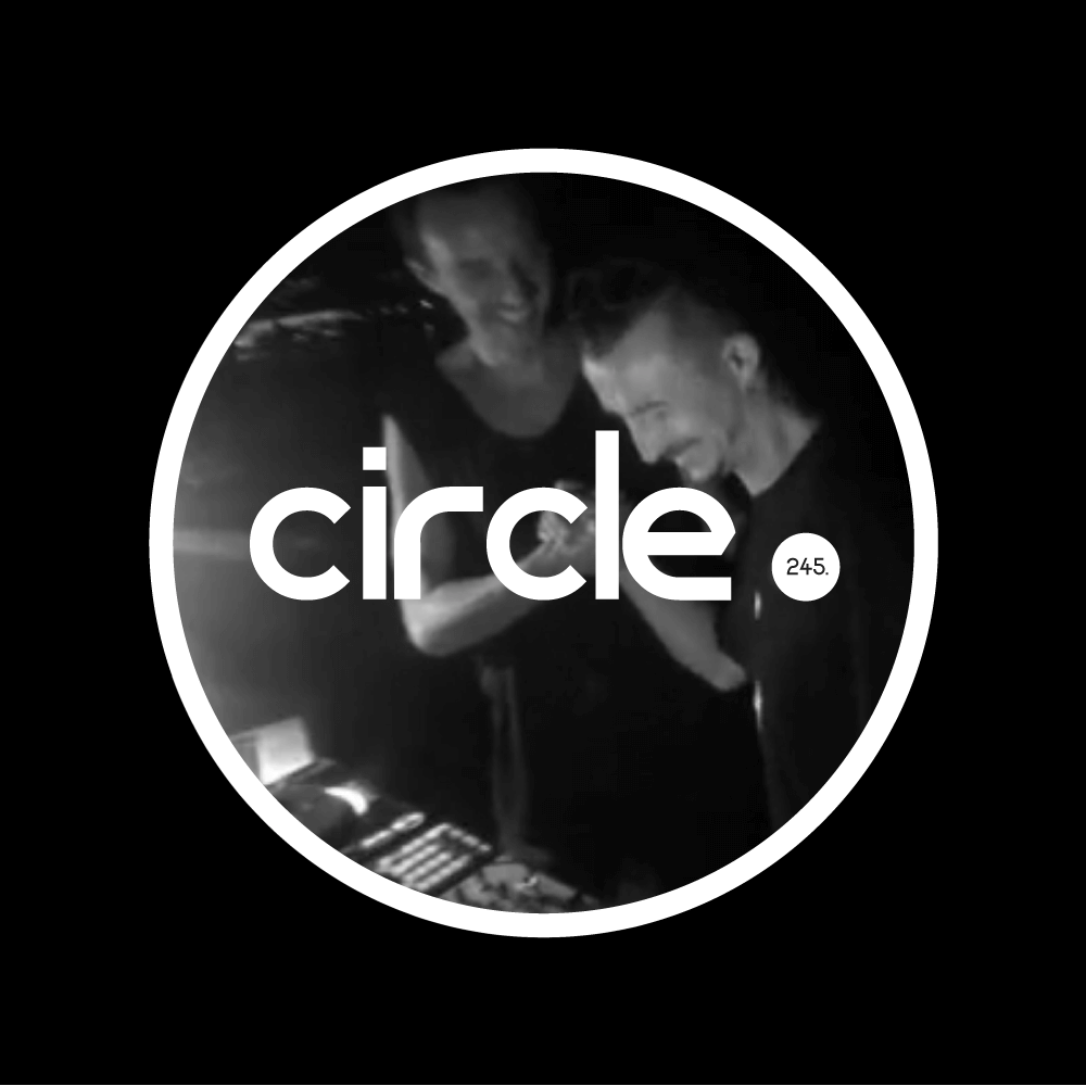 Black-and-white Circle 245 cover artwork featuring Pete Bidwell and Otti Fabian performing together, framed by a large white circle with the word “circle.” across the image.