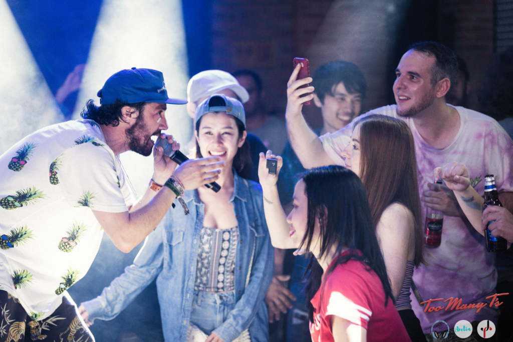 Leon Rhymes from Too Many Ts rapping at an event for Scientific Sound Asia.