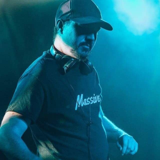 Australian DJ and producer Near Edge performing at an event, coloir image.