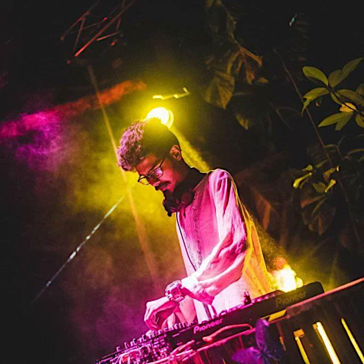 Sri Lankan DJ and producer IMaL SL performing at an event in Colombo, colour image.