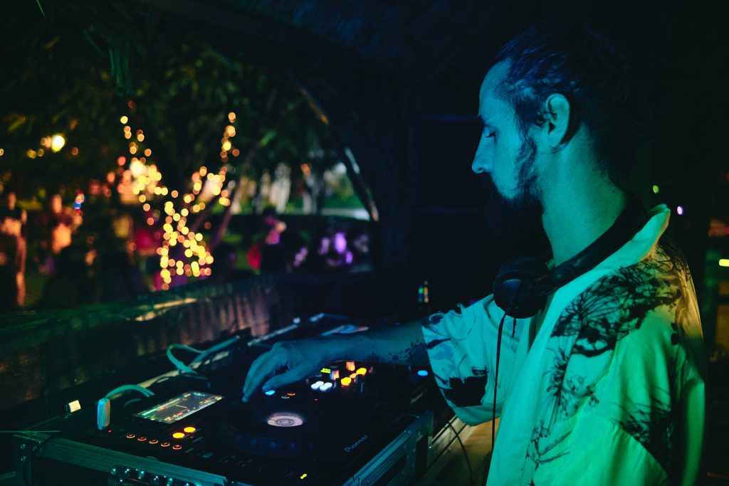 French DJ and promoter Dalah performing at an event in Thailand, colour image.