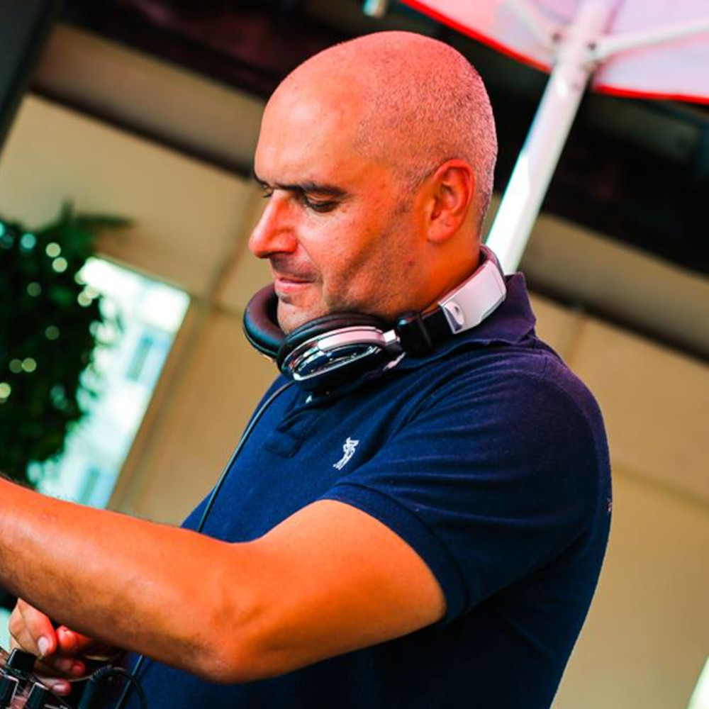 British DJ and producer DJ Psycho-UK performing at Saigon Pool Party, colour image.