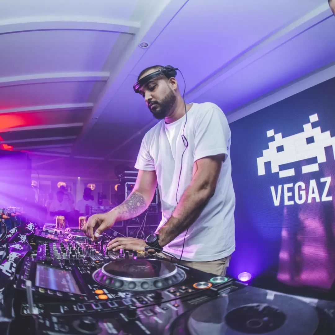 Sri Lankan DJ and producer VegaZ SL performing at an event in Colombo, colour image.