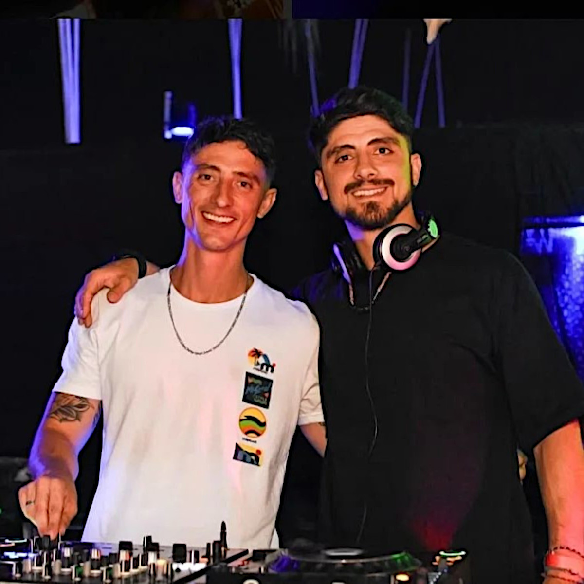 Argentinian DJs and Producers Mónaca Brothers performing at an event, colour image.