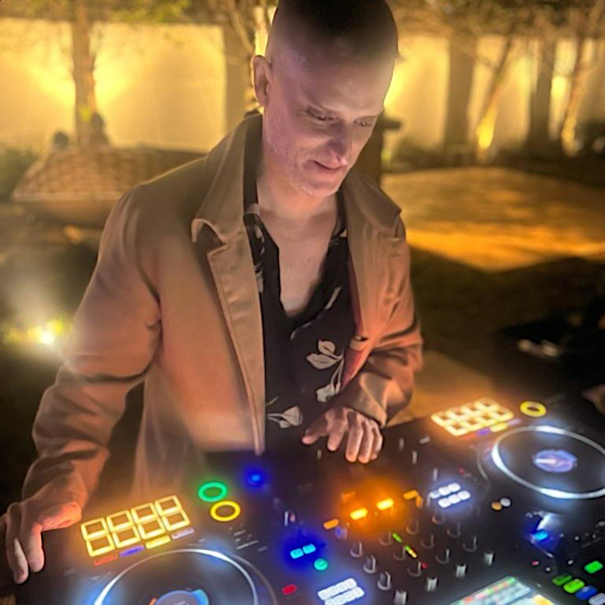 United States DJ and producer Peter Parrado performing at an event, colour image.