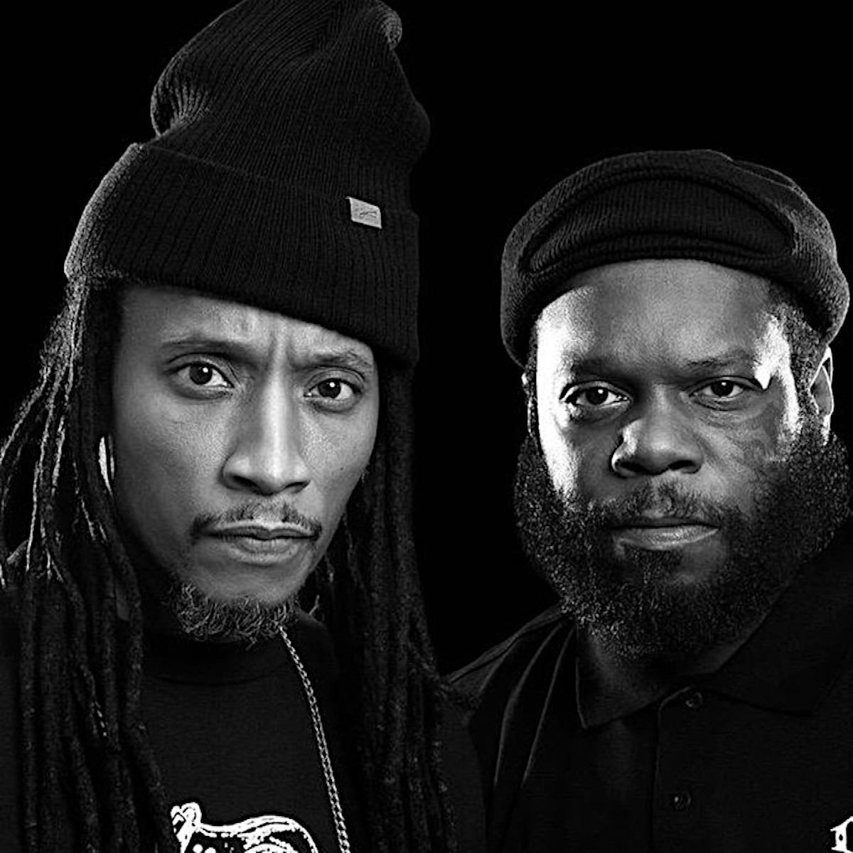 American Hip Hop duo Smif-N-Wessun in upper body profile shot, black and white image.