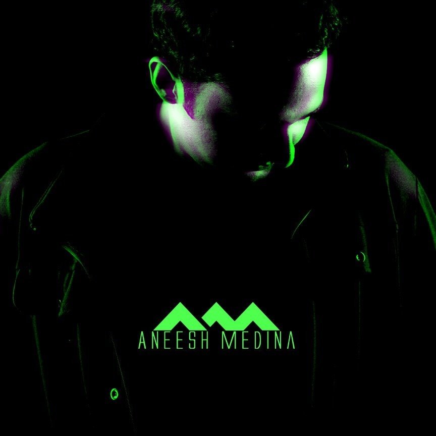 Indian DJ and Producer Aneesh Medina head down to the left picture in black and white with green tint.