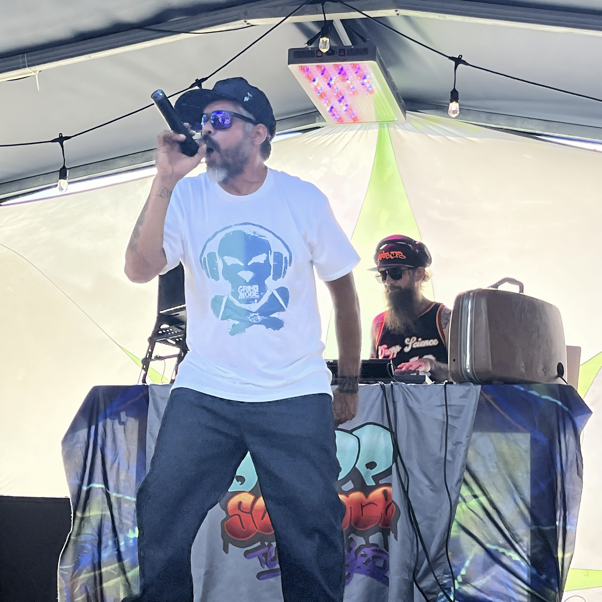 American DJ, Rapper and Hip Hop icon Ernesto “sympL” Gutierrez performing live with DJ Scientist in 2022, colour image