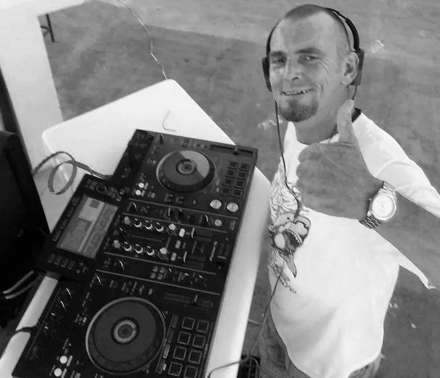 Guest DJ the Themaddeejay, performing at an event.