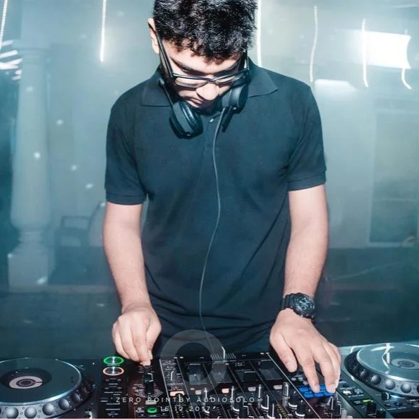 Sri Lankan DJ and producer Kryptone performing as a DJ at an event on Pioneer DJ equipment.