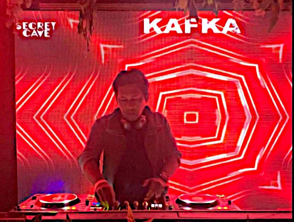 Indian DJ Kafka performing at Secret cave in India, colour image.