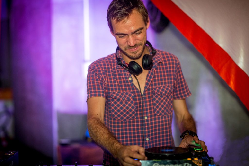 French DJ and Producer Anonymous Z performing at Arcan in Saigon on Pioneer CDJs, colour Image.