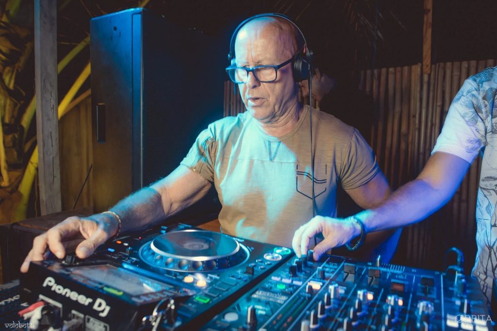 British DJ and producer Graham Gold performing as a DJ at an event in Goa, India, colour image.