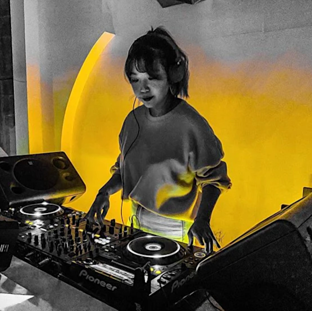 Korean DJ PLOI performing at an Event in Soeul, colour image.