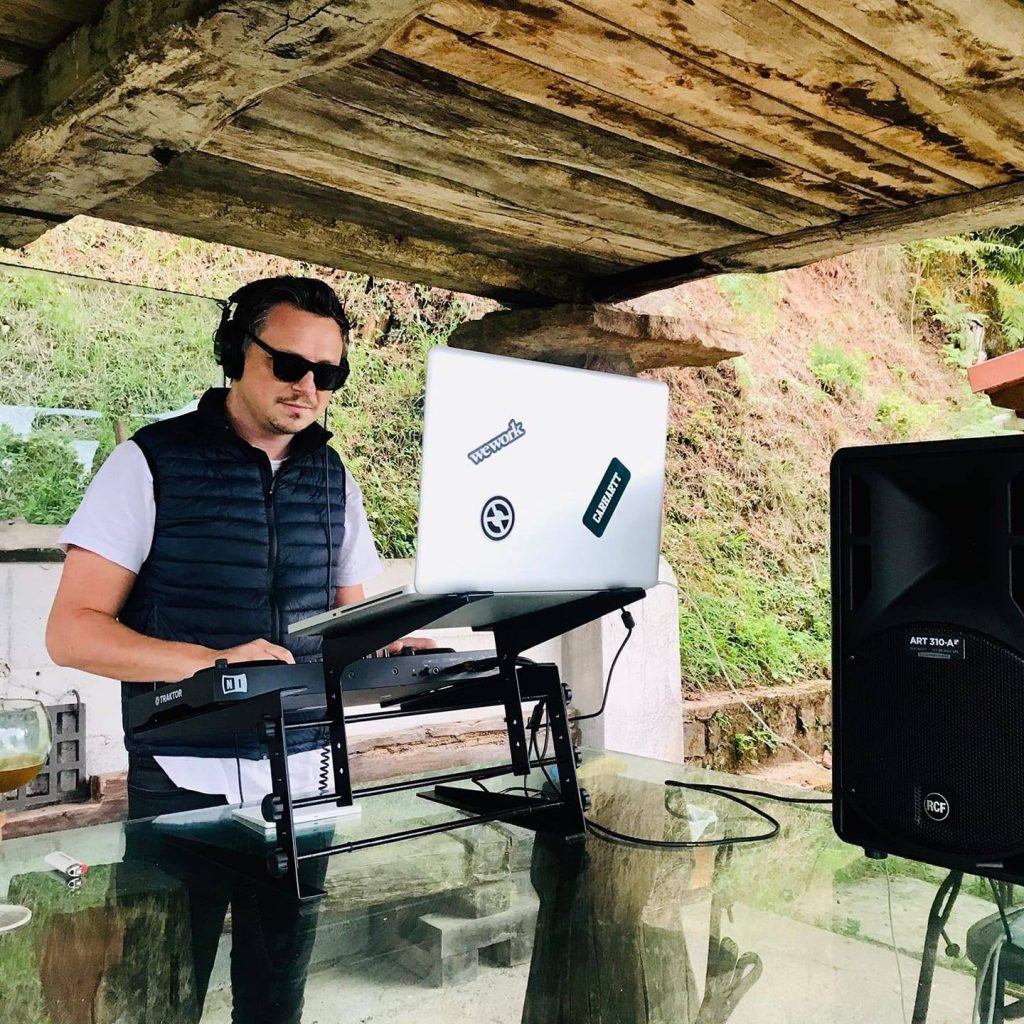 British DJ and Producer Breed Intel a.k.a Alexander McCann performing at an event in Spain, colour image.