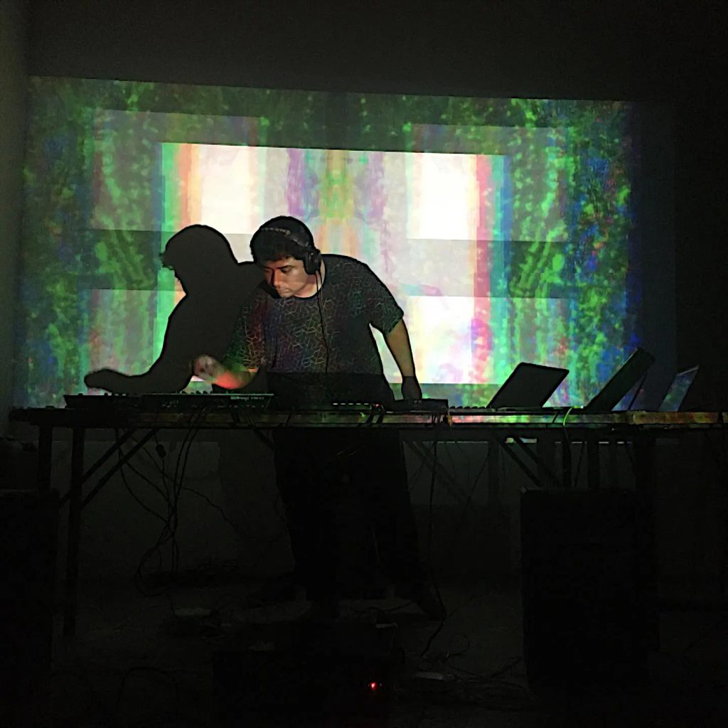 Bangaladeshi DJ and producer Dr Moonstruck performing at an event, colour image.