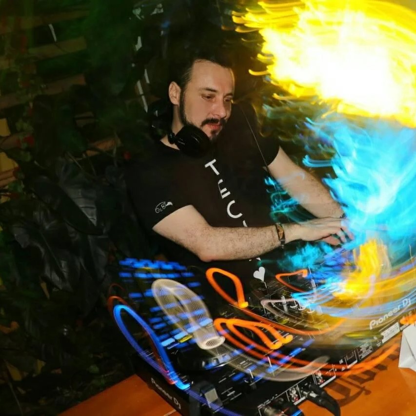 Colombian DJ Andres Fierro performing at an event, colour image.