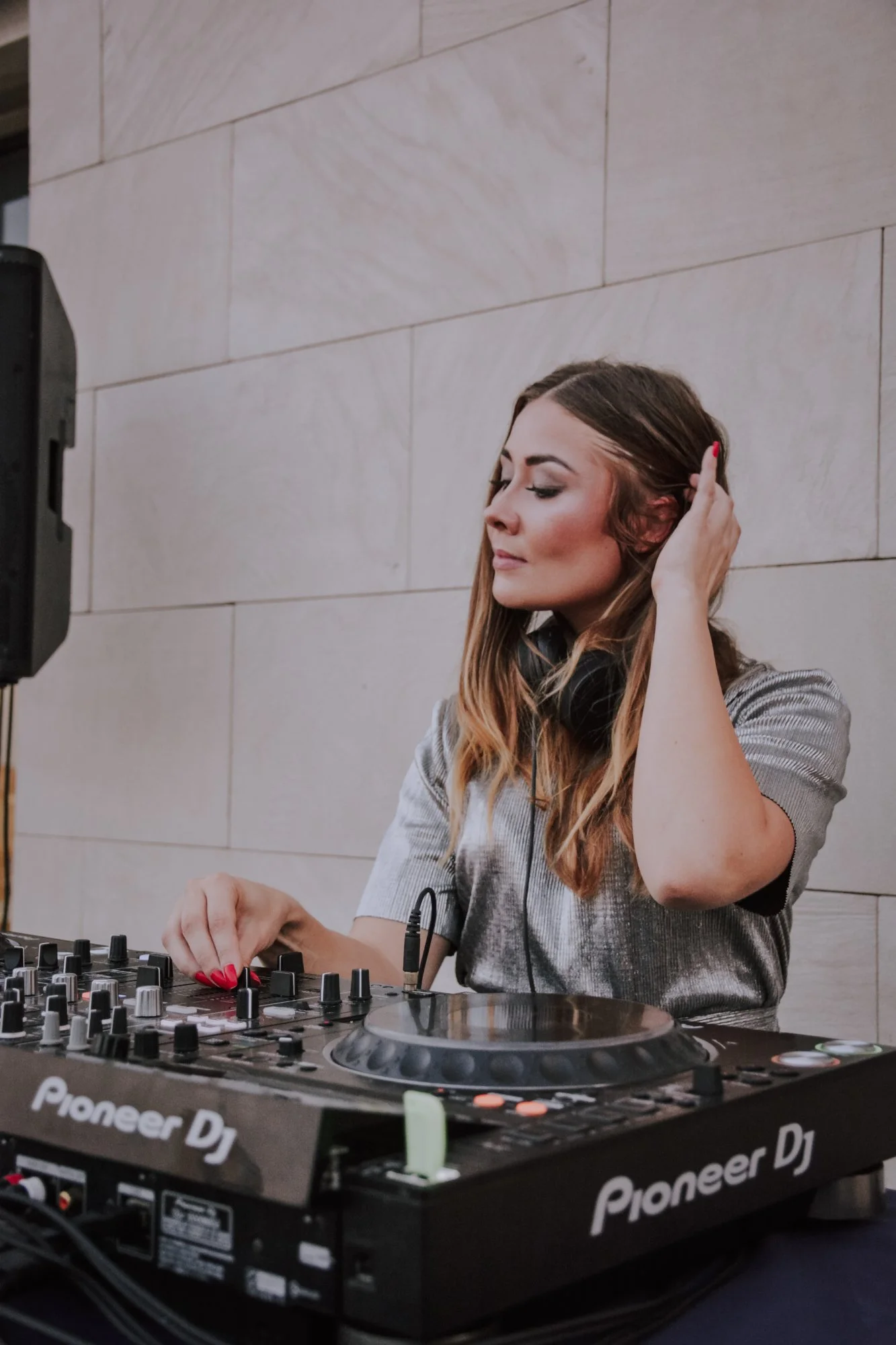 Finnish DJ Marsii performing at an event in Barcelona, Spain, colour image.