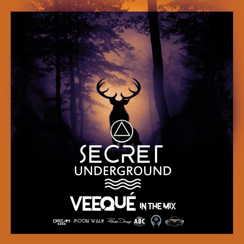 Secret Underground VeeQué in the mix logo, featuring a male Deet standing in twilight in a forest, colour image.