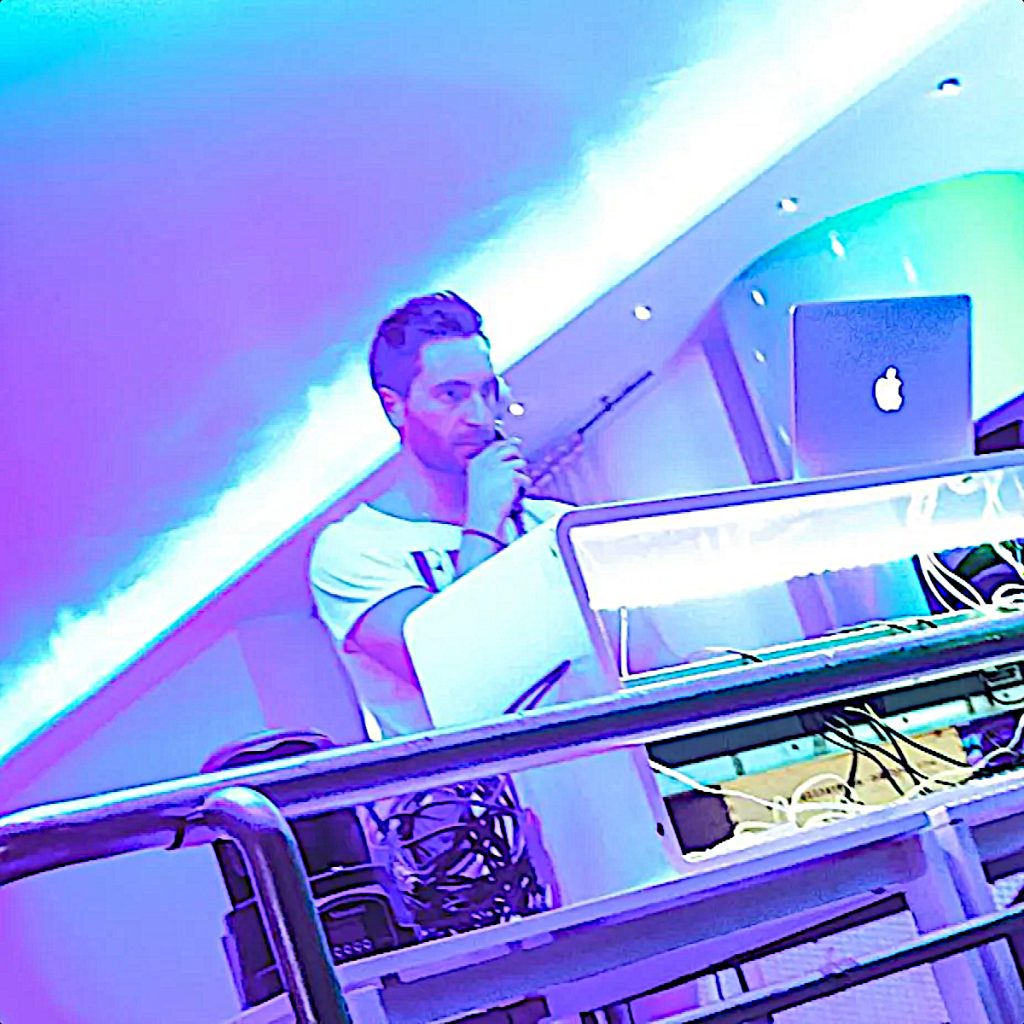 Italian DJ and producer Inve performing at Ibar, colour image.