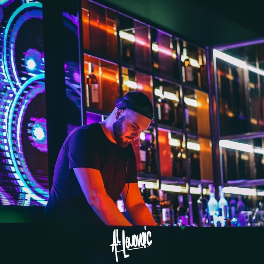 Slovakian DJ Al Loudvoic performing as a dj at an event.