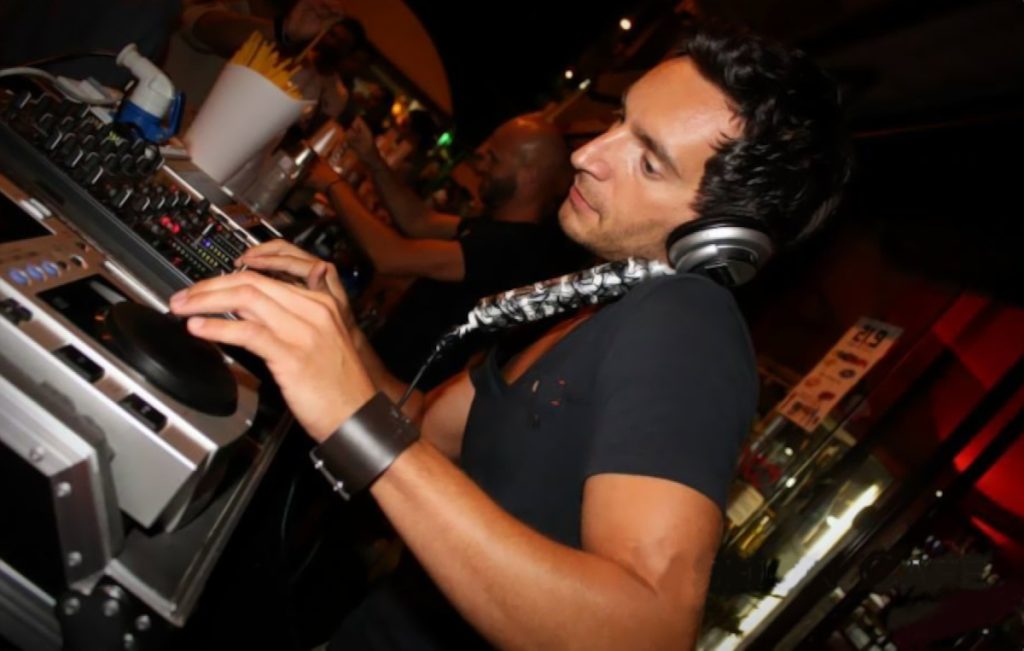 Italian DJ and producer INVE performing at an event on Pioneer DJ Equipment, colour picture taken at 45 degrees.