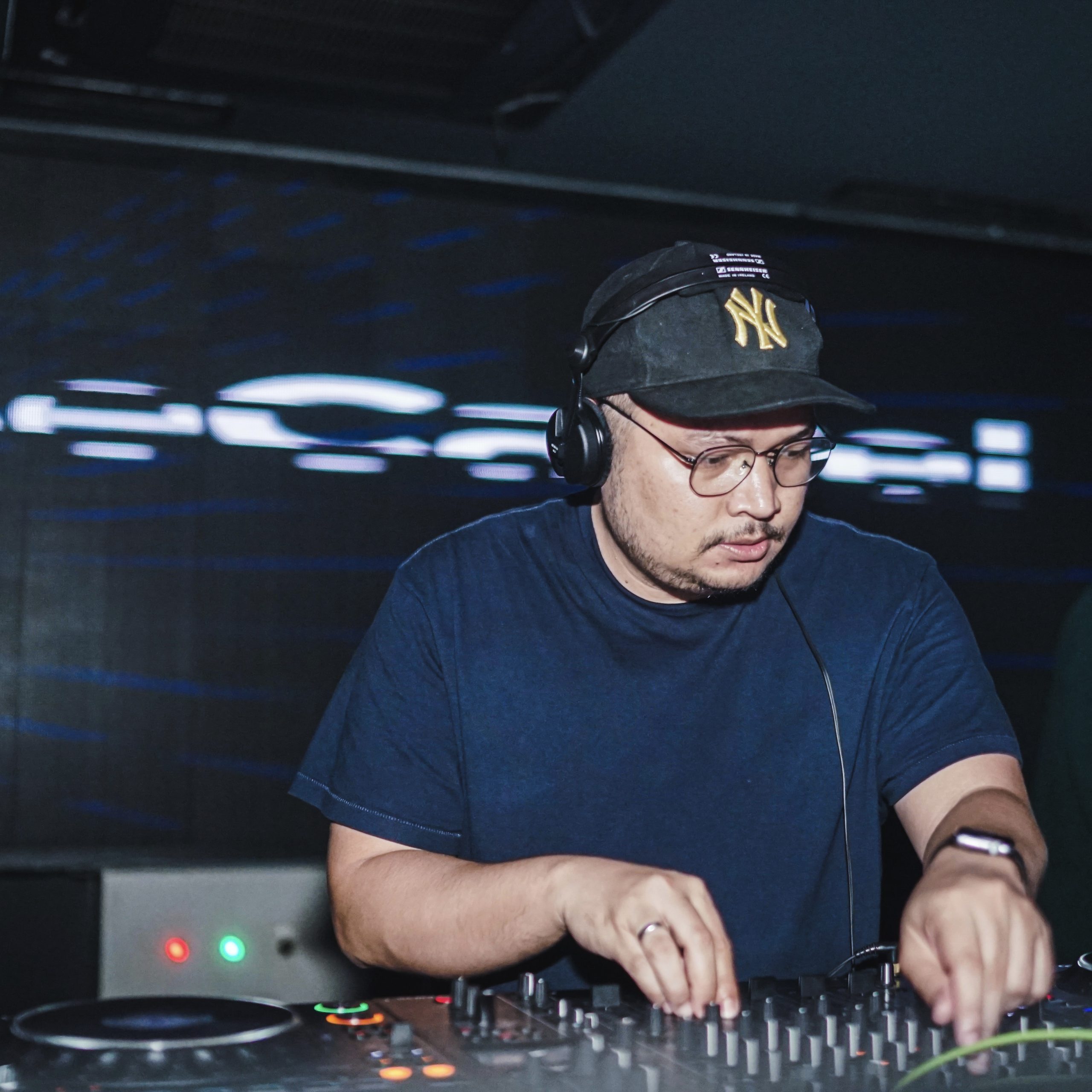 Indonesian DJ and producer Robin Rahardian performing as a DJ in Jakarta, colour image.