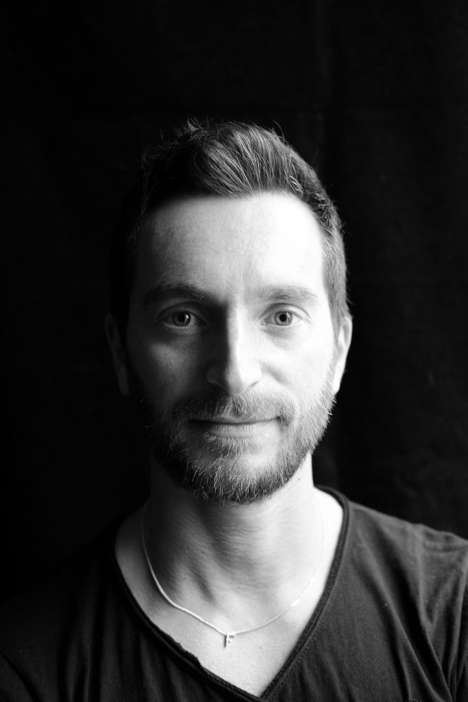 Italian DJ and Producer INVE in upper body shot, black and white image.