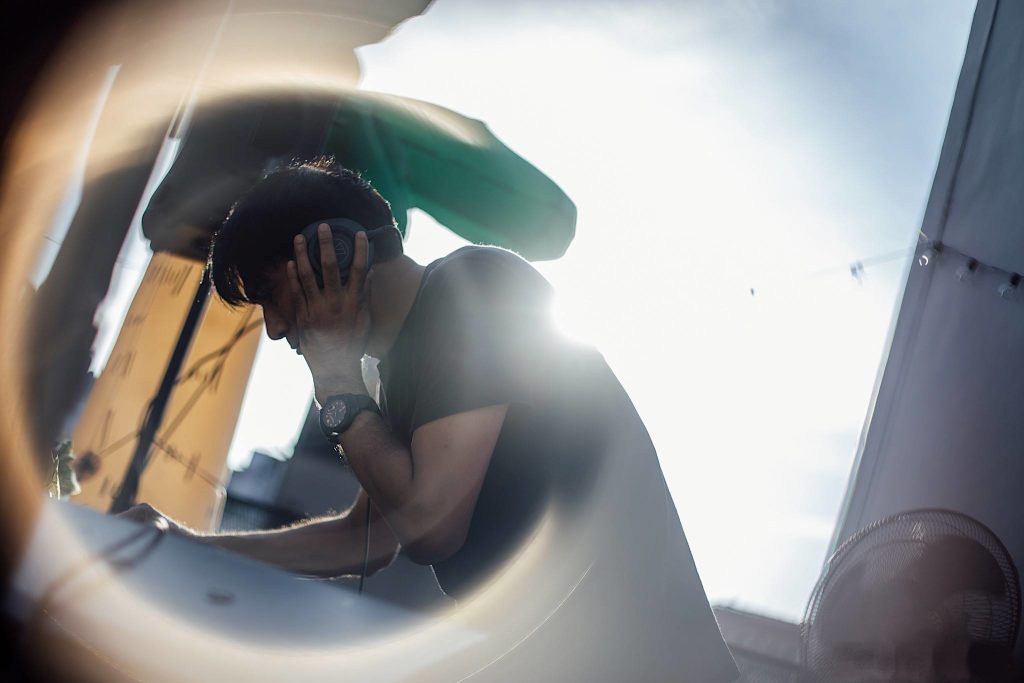 Singaporean DJ and producer Brendon P performing at the Council, colour image.