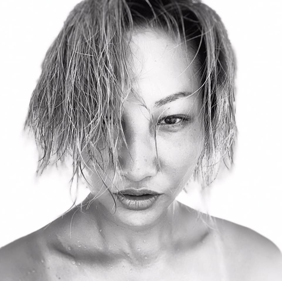 Chinese DJ and Producer Jasmine Li in a head shot, black and white image.