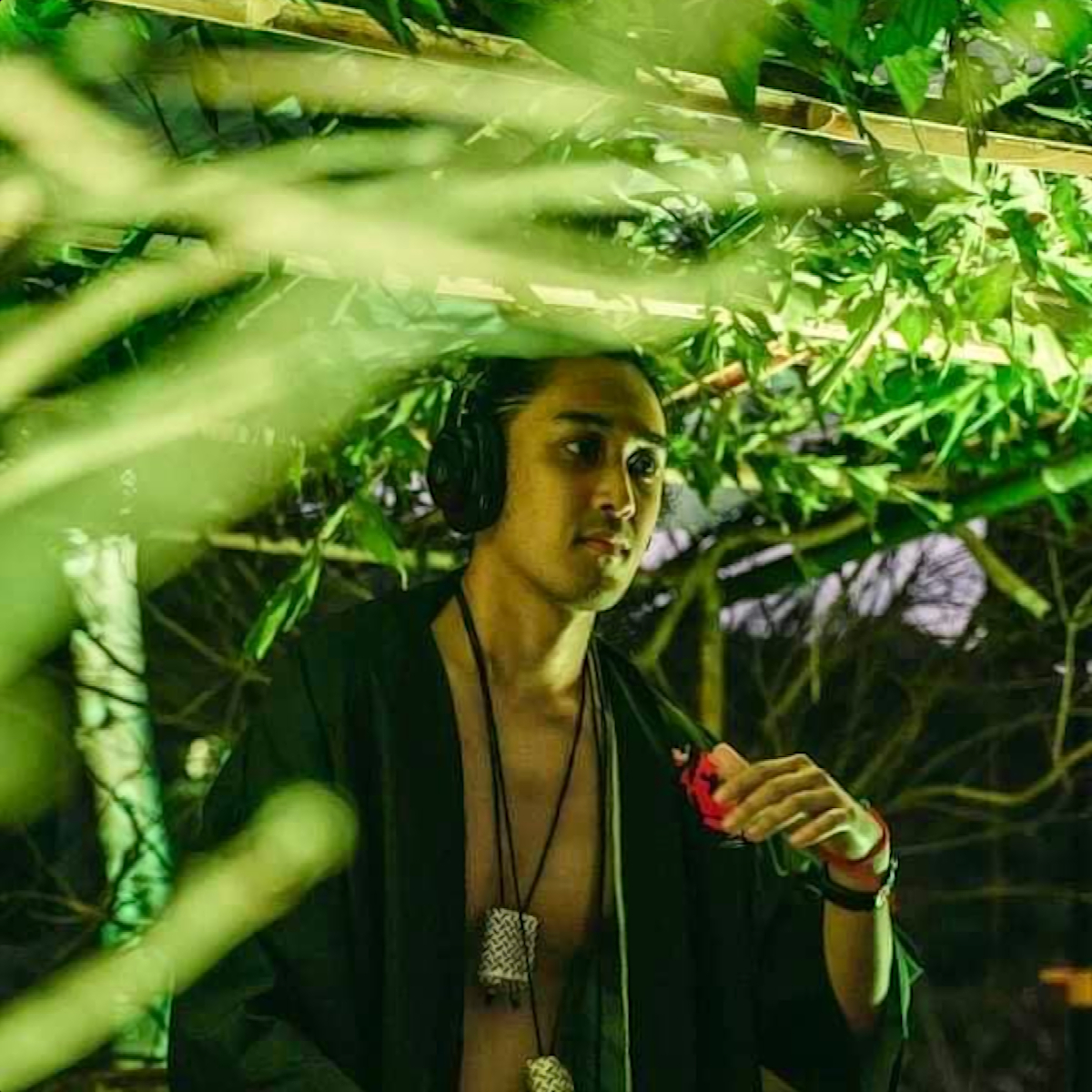 Fil;ipino DJ Elmer Fudge performing at an outdoor event, colour image.