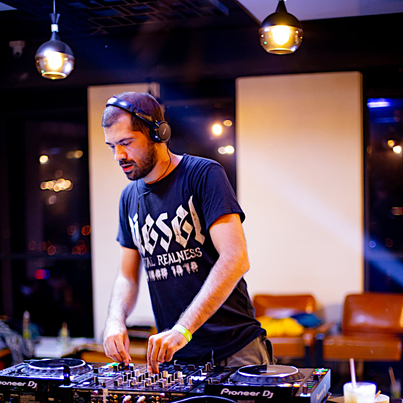 Romanian DJ and producer Bipolar Bear performing at AM PM Events in Da Nang, Vietnam, colour image.